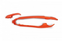 UFO plast Vodítko reťaze predné KTM SX/SX-F 23-, EXC/EXC-F 2024-, HUSQVARNA FC 23-, FE 24-, GAS GAS 24- oranžové